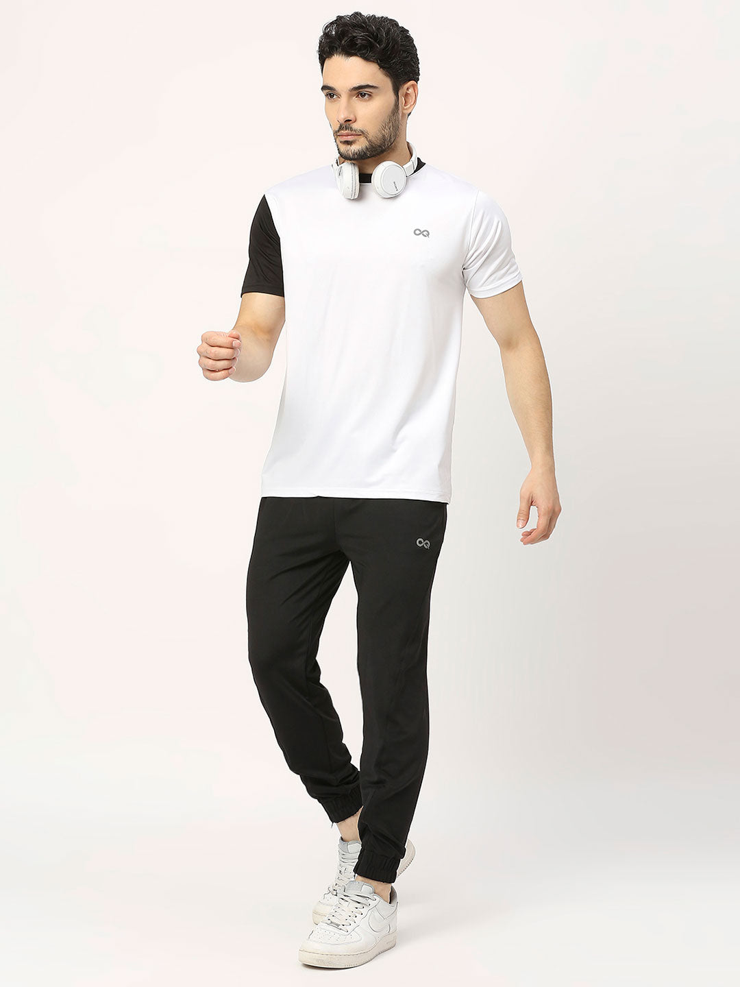 black and white with white shoes | White pants men, Black polo shirt men,  Black polo shirt